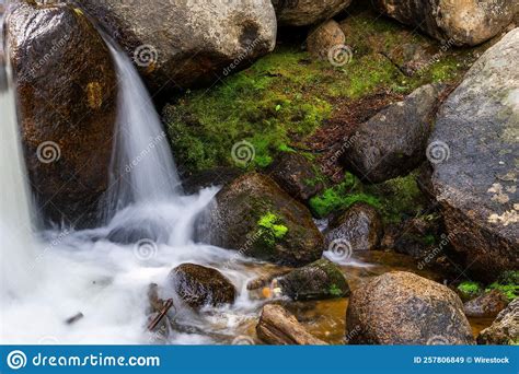 Long Exposure Shot Of Waterfall Between Rocks Stock Image Image Of