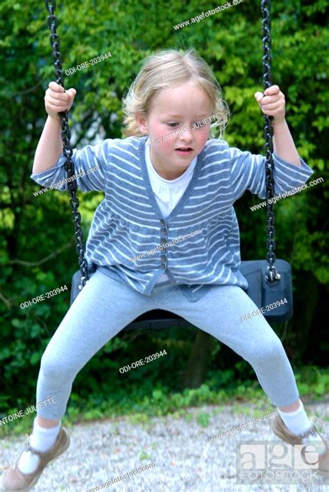 Little Girl Swing Stock Photo Picture And Rights Managed Image Pic