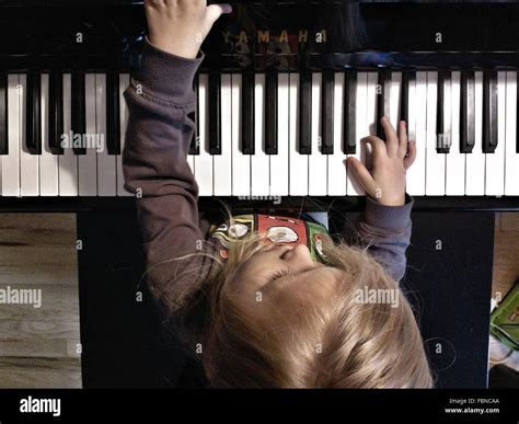 Child Playing Piano High Resolution Stock Photography And Images Alamy