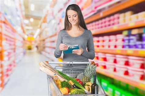 Premium Photo Young Woman Shopping In Grocery Store With Shopping Cart