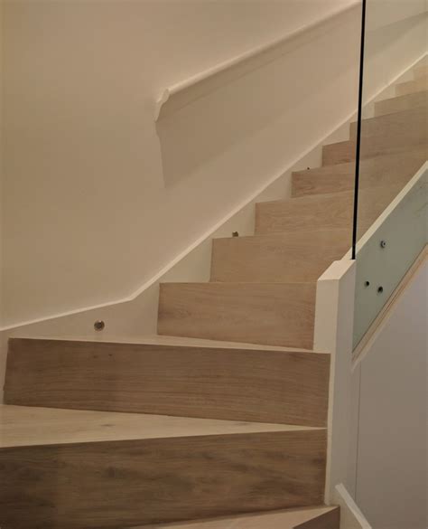 Modern Stairs Clad In White Engineered Oak With A Glass Balustrade Oak