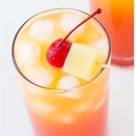 This Easy Pineapple Rum Punch Will Absolutely Be Your Summer Go To Drink After One Sip Of This