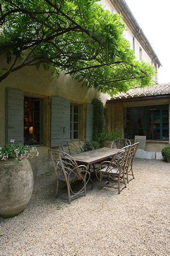 Elegant French Country Courtyard With Rustic Outdoor