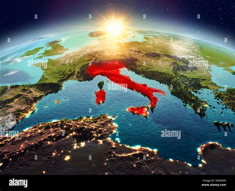 Satellite View Of Italy Highlighted In Red On Planet Earth With Clouds During Sunrise D