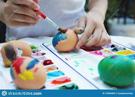 Colorful Easter Eggs Painting Activity With Color Tray Background Fun
