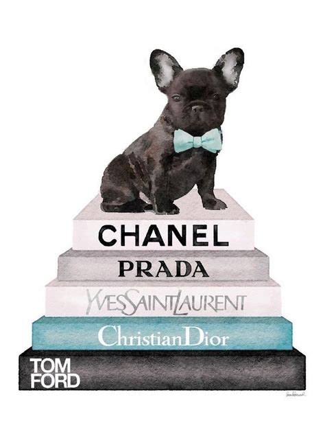 The french bedroom company, haywards heath, united kingdom. A french bulldog sits atop a stack of designer books ...