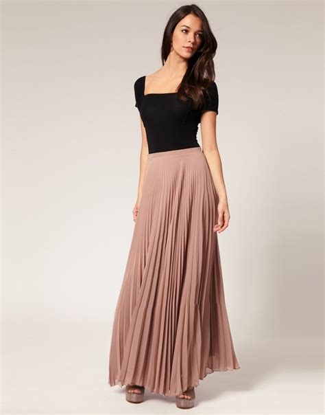 love long skirts so you just need to finish the look with a sweater in red perfect for the