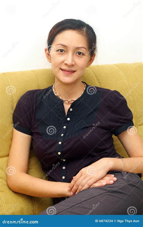 Smiling Chinese Lady Stock Photo Image Of Woman Sitting 6874234