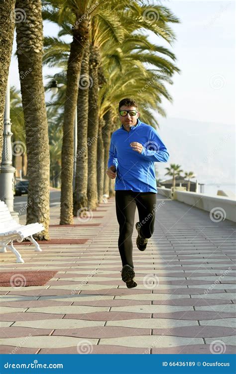 Sport Man Running Along Beach Palm Trees Boulevard In Morning Jog