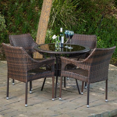 This compact patio table and chair set from keter is. Del Mar Wicker 5 Piece Outdoor Dining Set with 34" Round ...