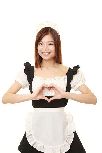 Young Japanese Woman Wearing French Maid Costume With Heart Stock Photo