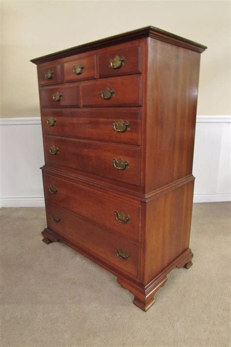 Case goods are dust proofed. ETHAN ALLEN EARLY AMERICAN SOLID CHERRY CHEST ON CHEST, 9 ...