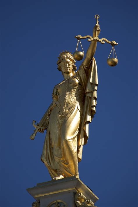 The statue of justice on top of the central criminal court, popularly known as the old bailey, in the city of london. Lady Justice - a photo on Flickriver