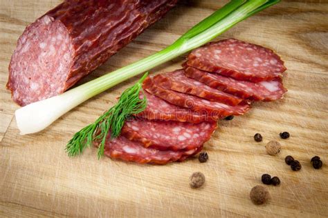 Salami Sausages On Wooden Board Isolated Stock Photo Image Of Gourmet