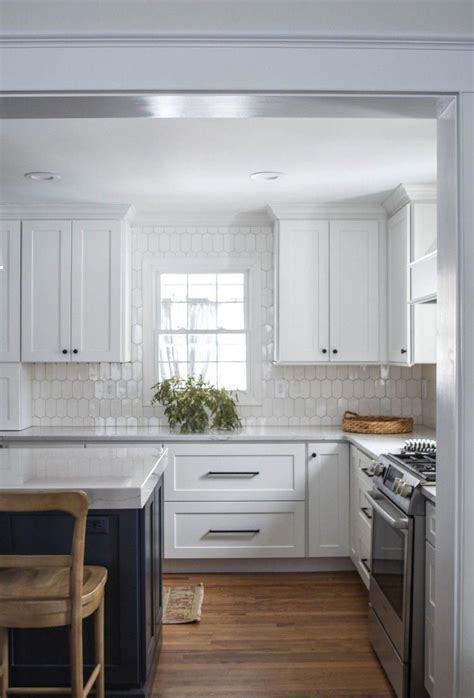 The yellow oven and colorful appliances are a great way to personalize a cooking space. gorgeous white shaker cabinets with black modern hardware ...