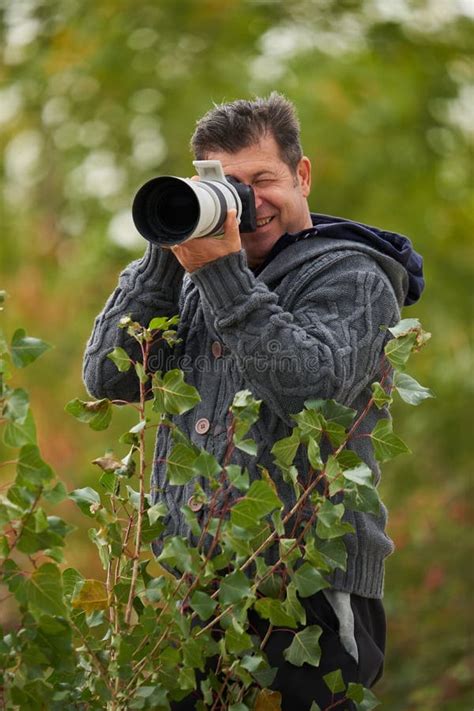 Professional Wildlife Photographer At Work Stock Photo Image Of