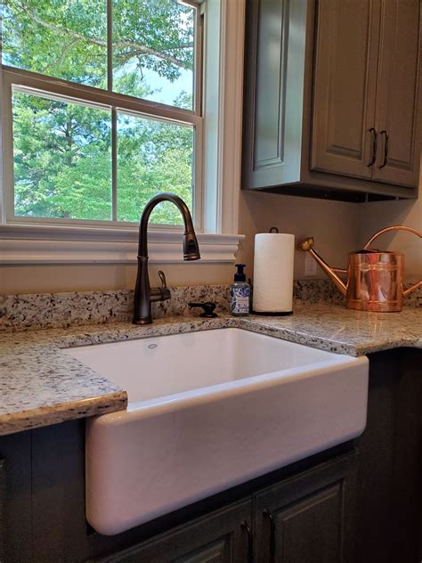 White Porcelain Farmhouse Kitchen Sink With Granite Countertops By