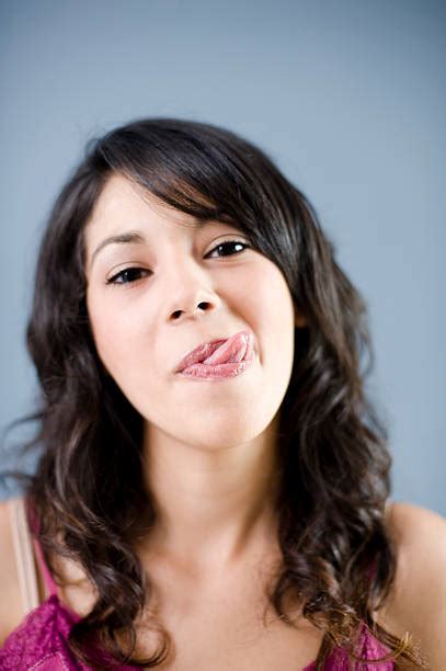 Cute Woman Sticking Her Tongue Out Stock Photos Pictures And Royalty