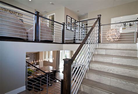 The particular stair design could make or break any home's look. Add rectilinear interest to enhance an open concept design ...