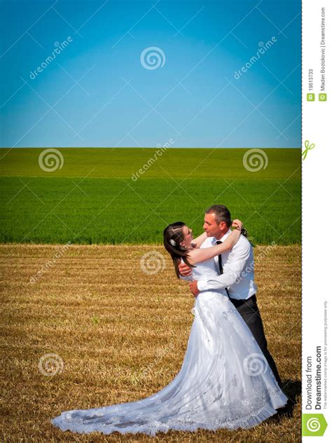 A Newlywed Couple Hugging Stock Image Image Of Male 19613733