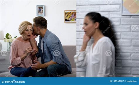 Woman Overhearing Husband Complaining On Marriage To Mother In Law Problems Stock Image Image