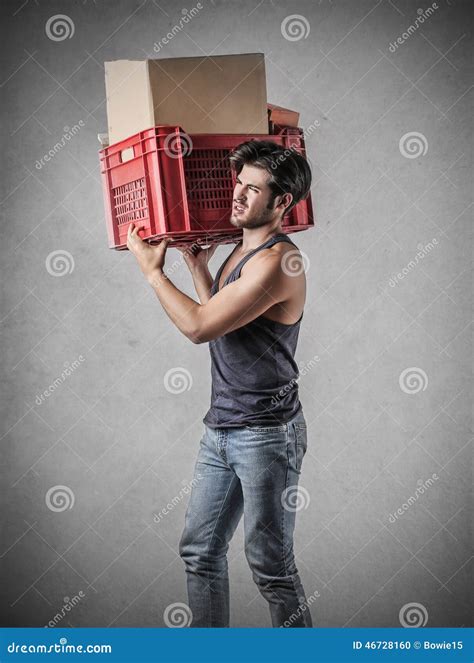 Man Carrying A Heavy Box Stock Photo Image Of Travel 46728160