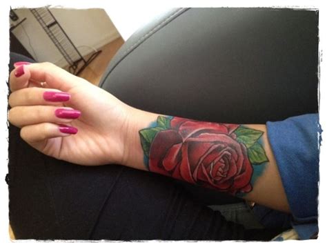Simple Big Red Colored Rose Tattoo On Arm Tattooimagesbiz