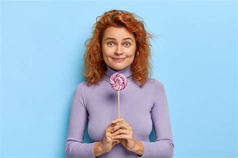 Free Photo Pretty Redhead Female Likes Lollipop