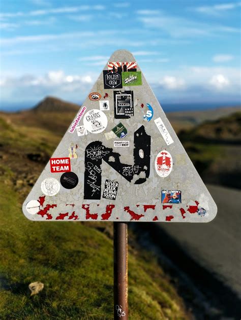 Stickers On Road Signage Photo Free Quiraing Image On Unsplash