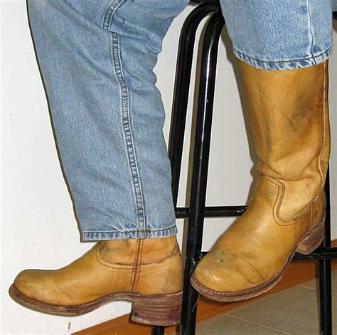 I bought the women's boot two sizes up and they fit great plus the heel height is the same as the old men's frye boots. Banana Frye Campus Boots