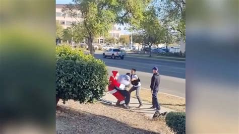 Undercover Cops Dressed As Santa And His Elf Make Comical Arrest Of