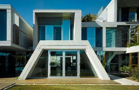 Architecture Trapezoid House Shape Wiht Glass Door With
