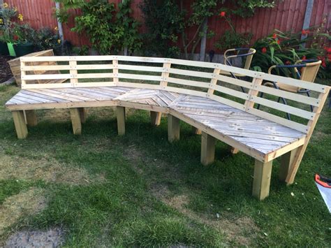 Diy circle bench around firepit simple diy outdoor firepit: Now just needs to be painted! Upcycled curved fire pit bench! Made from old pallets and bed ...