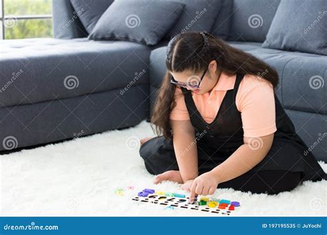 Autism Girl Enjoys Playing With Toys At Home Stock Image Image Of People Autism 197195535