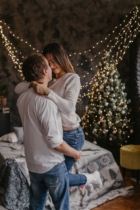 Romantic Couple In Love Feeling Happiness About Their Romance Spending Christmas Eve Together
