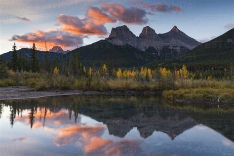 Sunrise In Autumn At Three Sisters Peaks Near Banff National Park