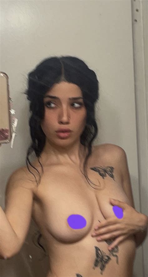 What Is The Name Of This Girl With Butterfly Tattoos Taking A Nude