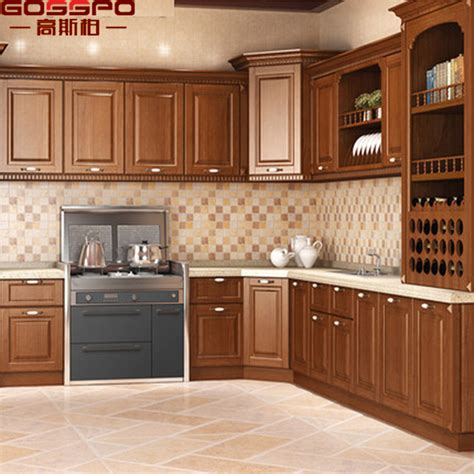 Although the space receives only ambient natural light from. China Modern Simple Designs Wood Kitchen Cabinet with High ...