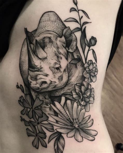 Rhino Tattoos Images And Design Ideas Tattoolist