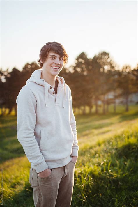 Handsome Teen Boy Portrait At Sunset By Stocksy Contributor Rob And