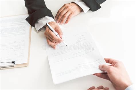 Female Hand Signing Agreement At Desk Stock Photo Image Of Blank