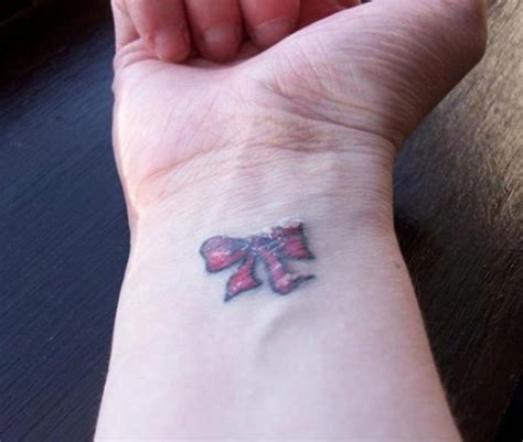 Little Bow Tattoo On Wrist Tattoo Designs Tattoo Pictures