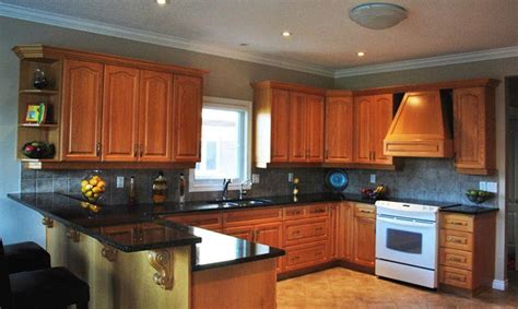 There are noticeable darker and lighter patches covering. Uba Tuba Granite With Light Maple Cabinets | www ...