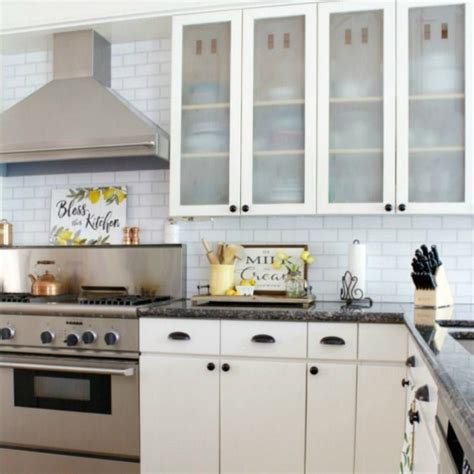 Now that the grease and grime has been removed, you need to sand scuff all of your cabinet. The Design Twins | DIY Home Decor Inspiration Blog ...