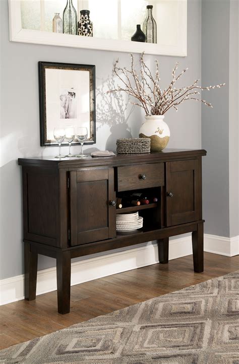 Due to increased demand and shipping delays, you may experience longer wait times to receive merchandise. Haddigan Dark Brown Dining Room Server from Ashley (D596 ...