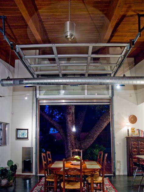 A glass garage door is a window and door in one, it's a great way to connect the spaces, to bring much light and fresh air in and to enjoy the views. Interior Garage Door | Houzz