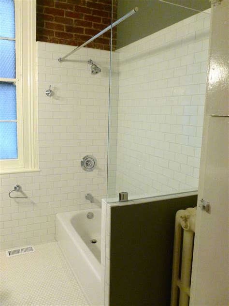 Look at this stunning example from splash galleries. Fan District Shower Door Richmond Va Bath Tub Panel with ...