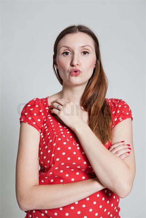 Attractive Woman Blowing Kiss Stock Image Colourbox