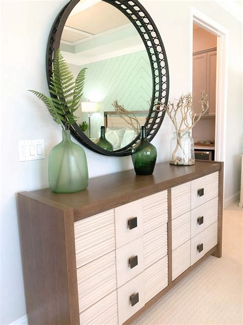 Give visual expression to your personality with a unique wall creation. Seafoam Green Airy Bedroom Design Beach House Tours in ...