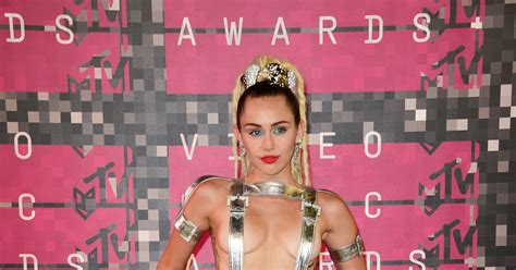 Miley Cyrus Goes Topless Again ExtraTV